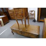 An old French Marble topped bedside cupboard and a reproduction French style dressing table, having
