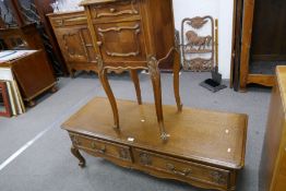 An old French Marble topped bedside cupboard and a reproduction French style dressing table, having