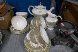 Royal Doulton teaset 'English Renaissance', good condition and a matt black bowl supported by carp b