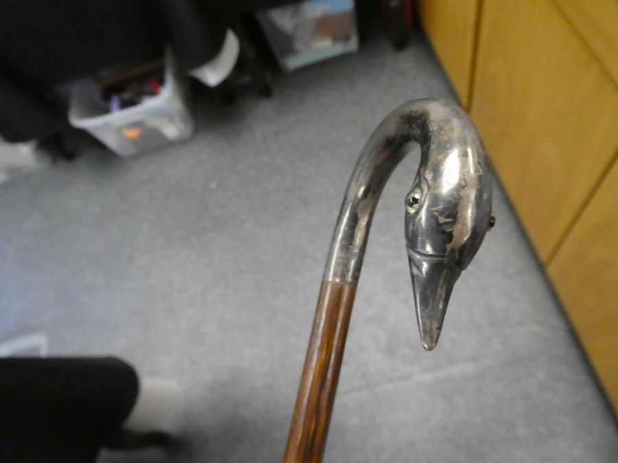 A Victorian cane having silver swan neck handle - Image 2 of 3