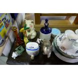 A large pestle and mortar, collection of Royal Albert green and white teaware, a porcelain elephant,