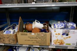 Three boxes of mixed China and glassware to include blue and white chargers, jugs, some old willow