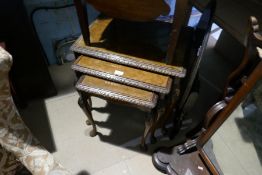 A nest of three mahogany coffee tables, a mahogany purdonium, a pair of antique hall chairs and Vict