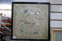 A small silk framed and glazed picture depicting water fowl and a vintage embroidered firescreen