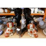 A quantity of porcelain dog figures, including Beswick, etc