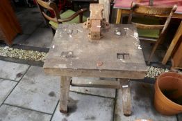 Vintage pine workshop table mounted with a vice