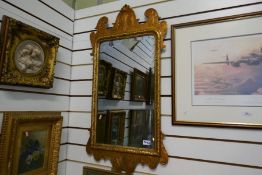An 18th century style gilt mirror