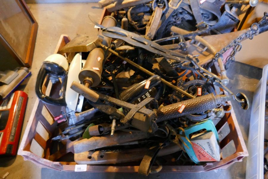 Two crates of antique and later metalware, horse harnesses, irons, yokes, etc