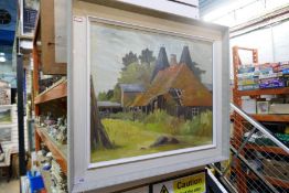 An oil on canvass depicting Oasthouses, signed Audrey Hill