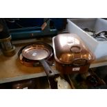 Two copper frying pans and copper dish and lidded copper casserole dish