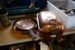 Two copper frying pans and copper dish and lidded copper casserole dish