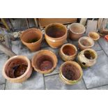 Quantity of various terracotta garden pots including a Strawberry pot, etc