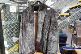 A vintage ladies black fur jacket