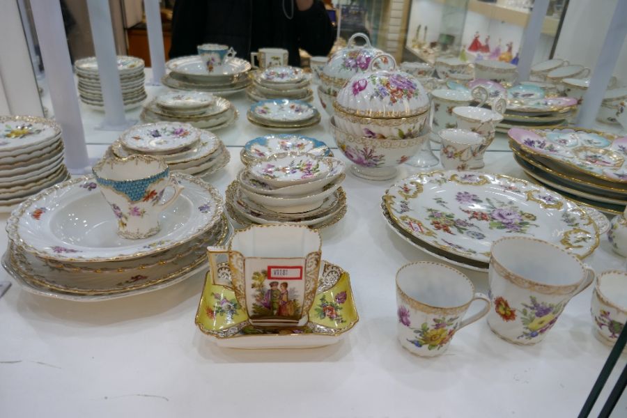 Large quantity of Dresden hand painted floral decorated tea ware to include four teapots of various - Image 8 of 9