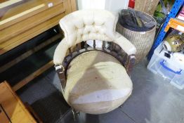 Victorian bedroom tub chair with button back with turned supports on castors