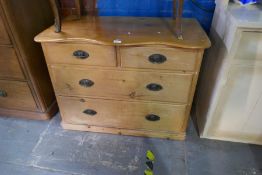 A vintage wax pine chest of 2 short above 2 long drawers with brass face mask handles, 95cm