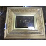 A 16th century oil painted panel depicting a tavern scene in gilt frame. 14cm x 9cm