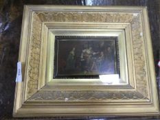 A 16th century oil painted panel depicting a tavern scene in gilt frame. 14cm x 9cm