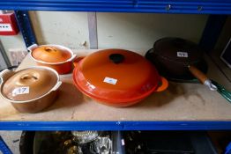 Three Le Creuset casserole dishes, a saucepan and AGA griddle pan