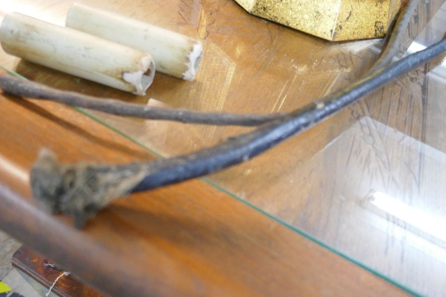 Two vintage walking sticks, possibly made from the tail of a bull etc - Image 4 of 4