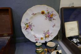 A collection of Royal Doulton character jugs, small in size, a Royal Crown Derby plate and a Moorcro