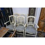 Set of six dining chairs including two armchairs