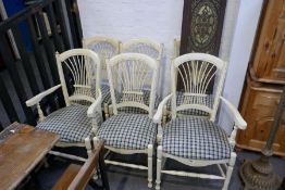 Set of six dining chairs including two armchairs