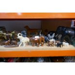 Various mostly carved animal figurines including elephants, baboon etc