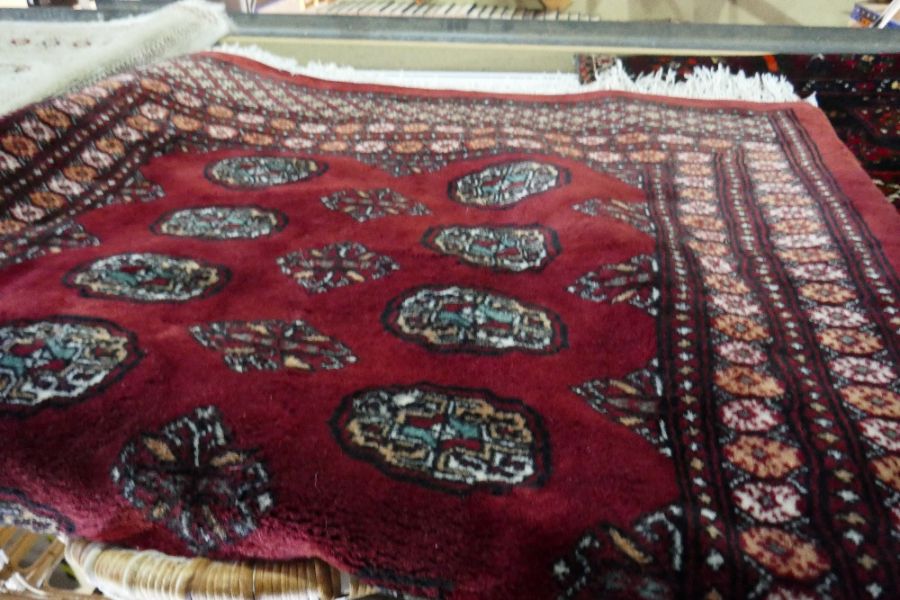 A middle eastern red ground carpet with elephant pad decoration and border - Image 3 of 6