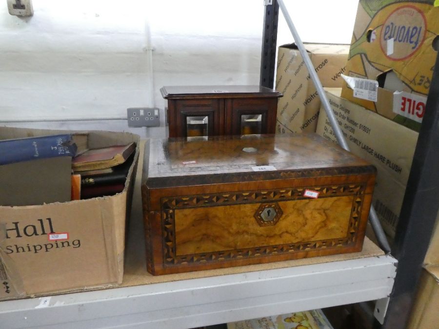 An antique walnut cross banded writing slope with mahogany two door mirror front cabinet, interior f