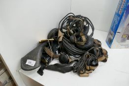 A selection of various vintage aircraft headsets, some stamped Ericsson