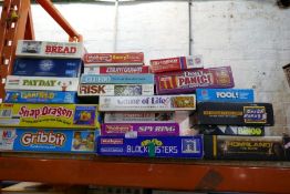 A selection of board games including Countdown, Bread, Cluedo, etc