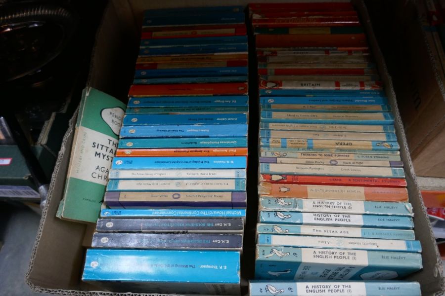 Two boxes of various paperback books, mostly penguin etc