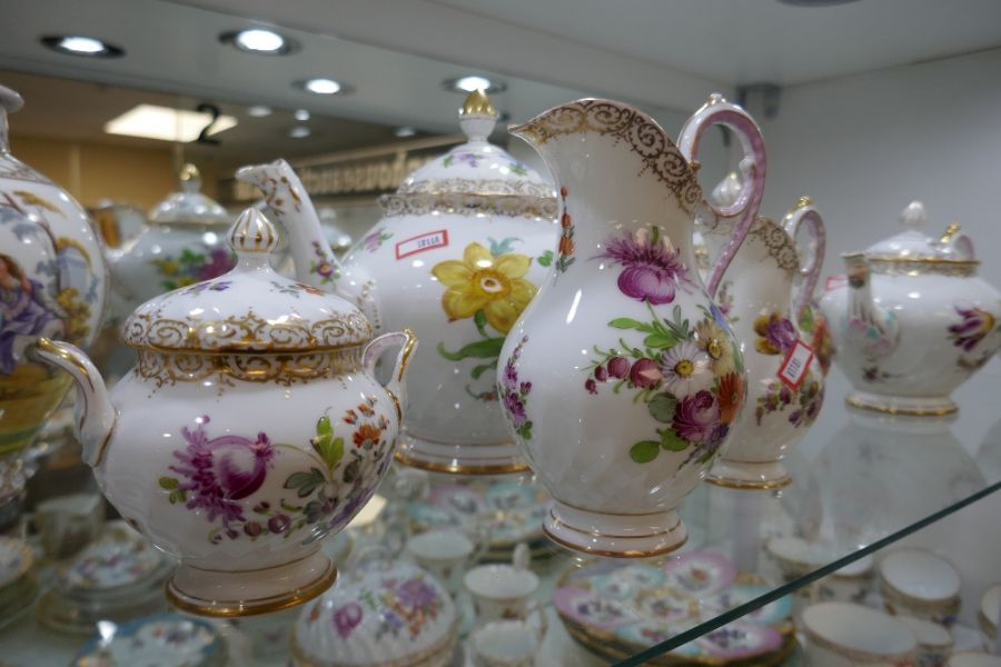 Large quantity of Dresden hand painted floral decorated tea ware to include four teapots of various - Image 5 of 9