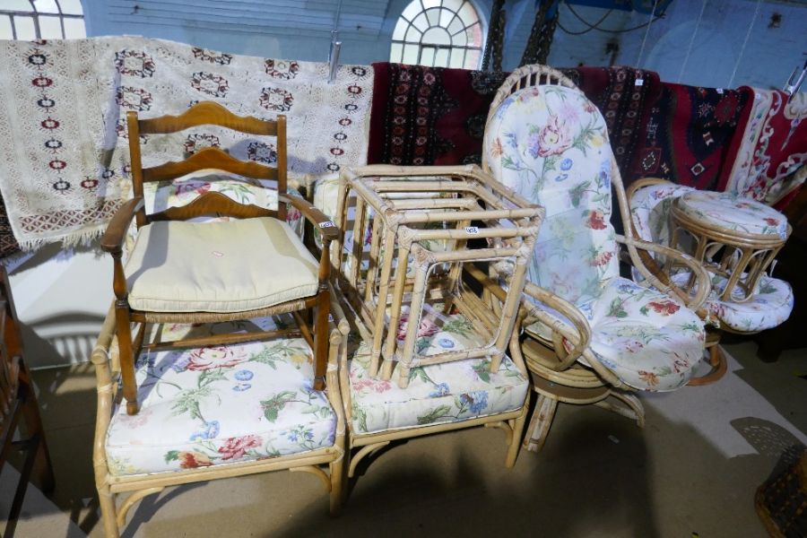 A bamboo conservatory suite comprising 2 arm chairs,  revolving chairs and a nest of tables and foot