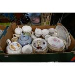 Two boxes of various floral decorated tea ware including Royal Albert teapot, Snow White and the Sev