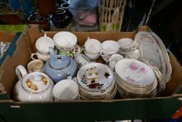 Two boxes of various floral decorated tea ware including Royal Albert teapot, Snow White and the Sev