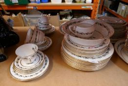 A quantity of dinner service containing plates, platters, dishes etc, manufactured by Worcester 'BER