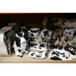 A quantity of model cows to include butter dishes, creamers, etc