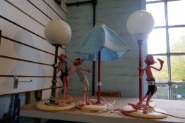 Three vintage lamps in the form of The Pink Panther