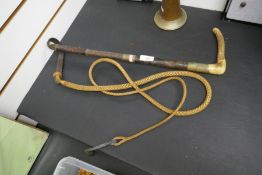 A vintage carriage riding crop, with an antler handle, stamped G.W. Bone