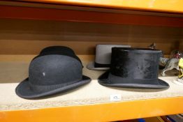 Two gentleman's bowler hats, one by Locke & Co, the other Dunn & Co, and two top hats