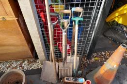 Collection of various long handled wooden tools