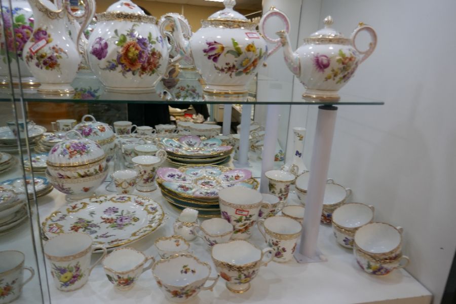 Large quantity of Dresden hand painted floral decorated tea ware to include four teapots of various - Image 9 of 9