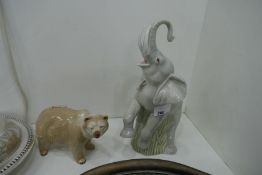 A Spanish porcelain figure depicting an Elephant stamped 'Gama' plus a figure of a Polar Bear