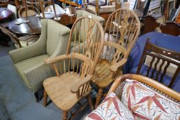 A pair of oak cottage armchairs with hoop and stick back on turned legs