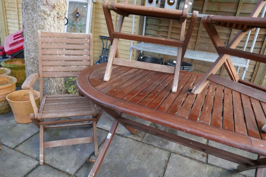 Oval teak garden table, four chairs and an armchair - Image 3 of 4