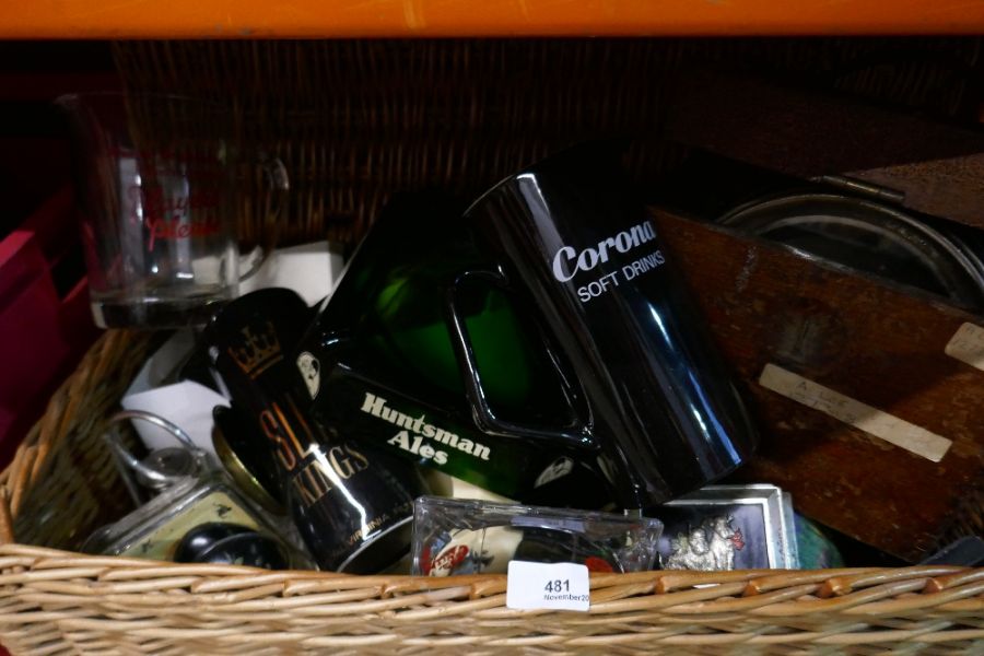 A wicker hamper containing various advertising items and box of collectables, including vintage weig