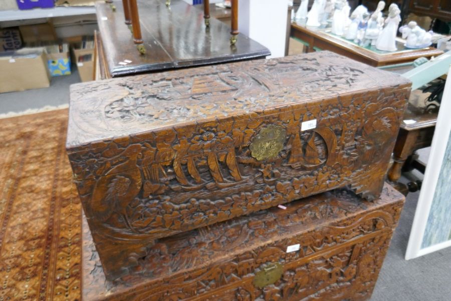 A camphor wood blanket box heavily carved with oriental decoration depicting ships and birds - Image 2 of 3