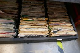 Large black carry case of 80s and 90s singles
